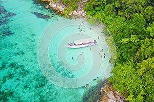 Aerial view over speed boat with beautiful sea and beach,Top vie