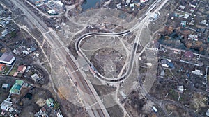 Aerial view over tram track U-turn and railway tracks in the private residential sector in Kiev, Ukraine