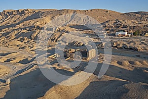 Aerial view over a village community on a desert mountain