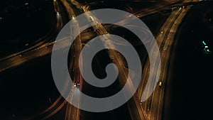 Aerial view of an overhead road junction at night