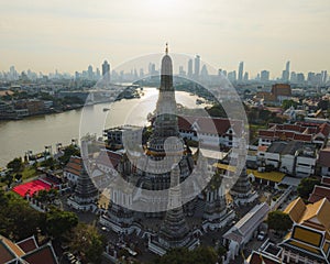 An aerial view of the Pagoda stands prominently at Wat Arun Temple with Chao Phraya River