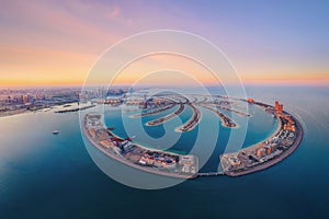 Aerial view of The Palm Jumeirah Island, Dubai Downtown skyline, United Arab Emirates or UAE. Financial district and business area