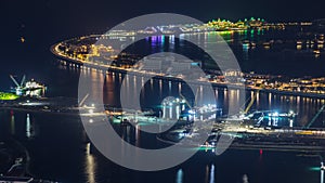 Aerial view of Palm Jumeirah Island night timelapse.