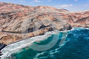 Aerial view of the Panamericana traveling from Ica to Arequipa with the Pacific Ocean on the right and the Peruvian Andes on the l