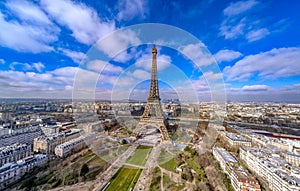 Aerial view panorama of Eiffel tower in Paris with blue sky and clouds