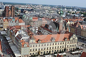 Aerial view of panorama of old town in the city of Wroclaw or Breslau in southern Poland in summer with red tile roofs