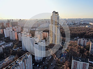 Aerial view panorama on the sunny day of the city landscape of the road highway in the Moscow district of Hovrino. Shot from drone