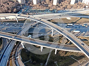 Aerial view panorama on the sunny day of the city landscape of the road highway in the Moscow district of Hovrino. Shot from drone