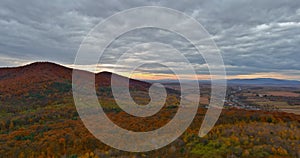 Aerial view of panoramic beautiful landscape with mountain scenery and autumn forest