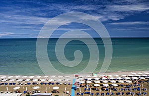 Aerial view of parasols and beachline in Marotta. For travel and holiday concepts