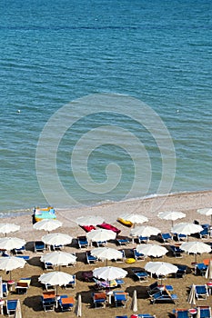 Aerial view of parasols and beachline in Marotta. For travel and holiday concepts