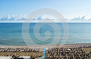 Aerial view of parasols and beachline in Marotta. For travel and holiday concepts