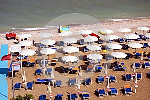 Aerial view of parasols and beachline in Marotta. For travel and holiday concepts