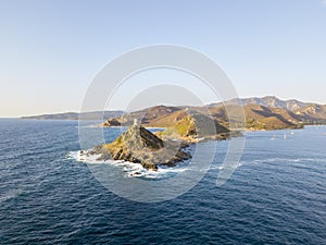 Aerial view of the Parata Tower from the sea, Corsica. France.