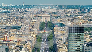 Aerial view of Paris and The Arc de Triomphe with Champs Elysees timelapse from the top of the skyscrapers in Paris