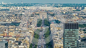 Aerial view of Paris and The Arc de Triomphe with Champs Elysees timelapse from the top of the skyscrapers in Paris