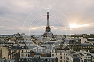 Aerial view of Paris rooftops and Eiffel Tower