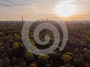 Aerial view of Paris skyline with Eiffel Tower from the Boulogne Forest at rising morning sun