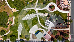 Aerial view of a park in Downtown Oakley, California with green grass and play structures