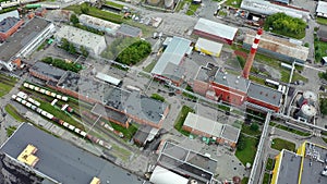 Aerial view park production plant. Manufacturing area in industrial city drone view. Territory industrial factory sky view. Aerial