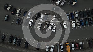 Aerial view of the parked cars in the parking lot. aerial shooting