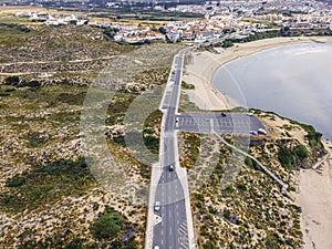 Aerial view of a parking lot along the Mira River in Vila Nova de Milfontes, Alentejo region, Portugal