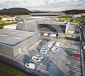 Aerial view of parking lot next to an office building