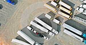 Aerial view of parking lot with trucks on transportation of truck rest area dock