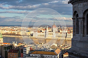 Aerial view on Parliament building, Danube River and City at sunset in Budapest, Hungary. High angle view of buildings and town