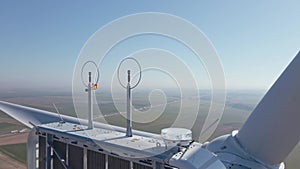 Aerial view of part of windmill turbine in countryside, Green energy