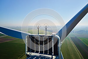 Aerial view of part of windmill turbine in countryside, Green energy