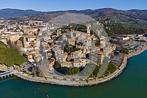 Aerial view of Passignano sul Trasimeno, a small town along the lake near Perugia, Umbria, Italy