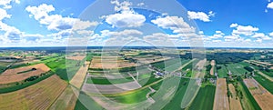 Aerial view of pastures and farmlands Beautiful French countryside with green fields and meadows. Rural landscape on sunset