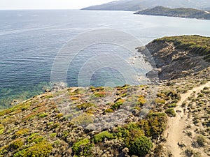 Aerial view of the path of customs officers, vegetation and Mediterranean bush, Corsica, France. Sentier du Douanier