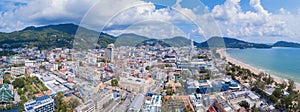 Aerial view of Patong beach, Phuket island and sea in summer, and urban city with blue sky for travel background, Andaman ocean,