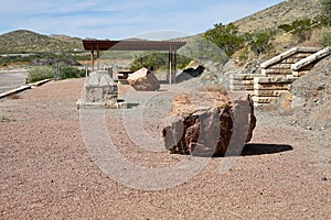 Aerial view of pavilion and rocks surrounded by dense trees