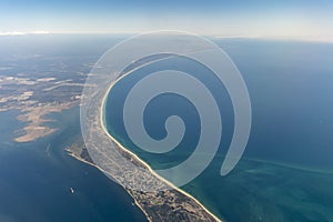 Aerial view of peninsula between Ria Formosa and Atlantic Ocean in Portugal