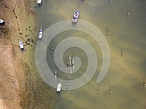 Aerial view of people doing kayak along Mira River in Vila Nova de Milfontes, Alentejo region, Portugal photo