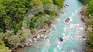 Aerial view of people in two boats enjoy on whitewater rafting