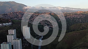 Aerial view of the Petare slum in the city of Caracas, Venezuela, at sunset. Bird eye view of a slum in a big city in South