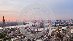 Aerial view petrochemical industrial oil refinery at sunset with