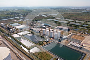 Aerial view of petrochemical oil refinery and sea in industrial engineering concept in Bangna district, Bangkok City, Thailand.