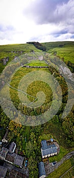 Aerial view of Peveril Castle ruins in Castleton in Peak District, England