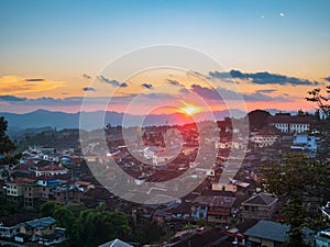 Aerial view of Phongsali, North Laos near China. Yunnan style town on scenic mountain ridge. Travel destination for tribal