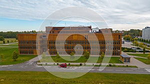 Aerial view of Physicum University of Tartu surrounded by growing trees