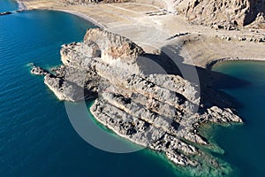 Aerial view of a picturesque beach and rocky coastline: Namtso, Lhasa, China.