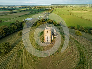 Aerial view of the picturesque Burrow Mump hill and historic site overlooking Southlake Moor photo