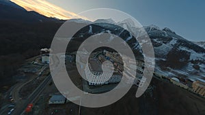 Aerial view picturesque mountain resort roof early morning scenery snowy tops