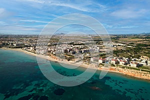 Aerial view picturesque sandy beach of Mil Palmeras. Spain