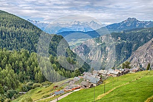 Aerial view of the picturesque village of Chamois, in Val D`Aosta, Italy. Its peculiarity is that cars are not allowed in the vill